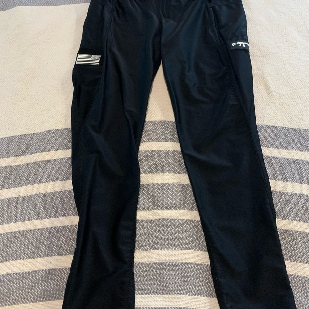 We The People Women’s black tactical leggings.